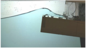 Regular Wave Interaction with a 2D Floating Structure